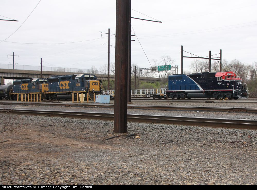 AMTK 751 sits, CSX 6235 & 6129 work